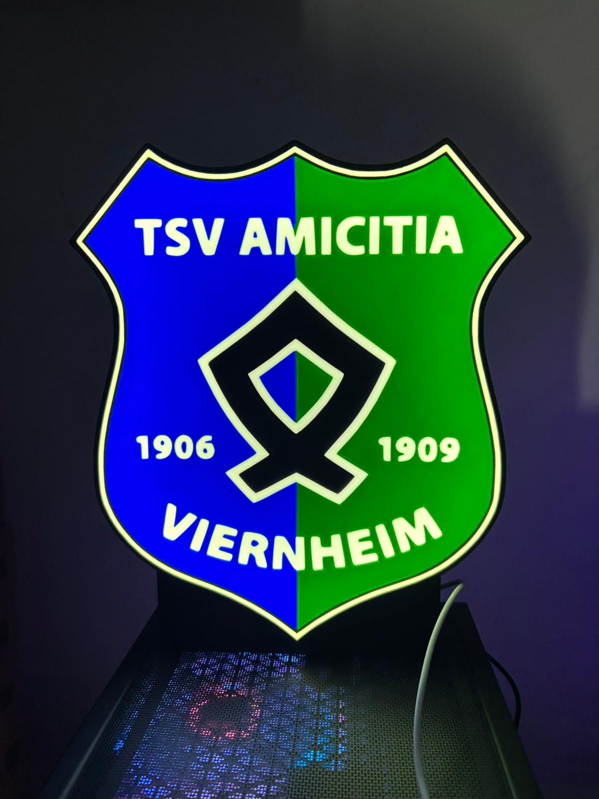 Leuchtende Lichterbox in Wappenform des TSV Amicitia Viernheim in Blau und Grün